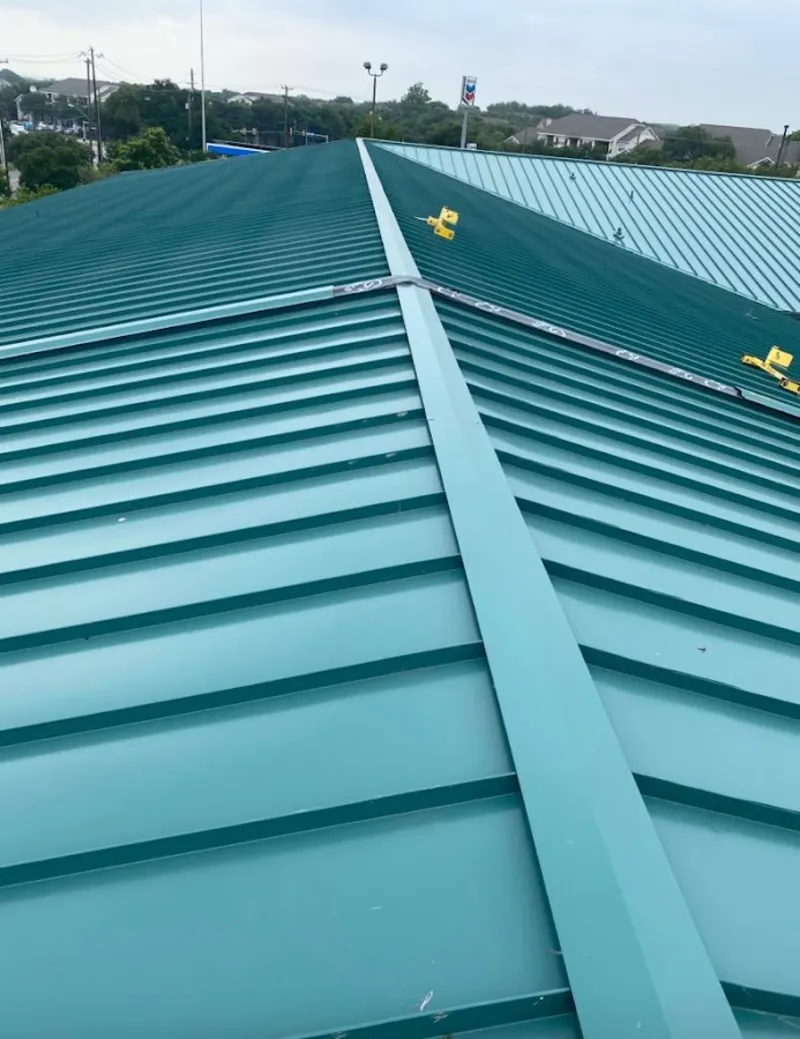 Green commercial metal roof ridge and valley for Metal Roof Repair in Greenwood